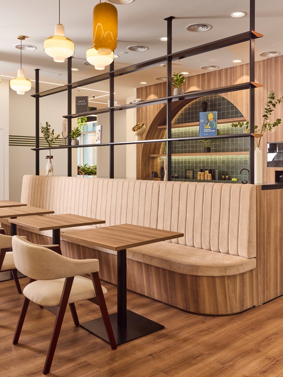 Banquette seating in the cafe at flowork Vision Tower